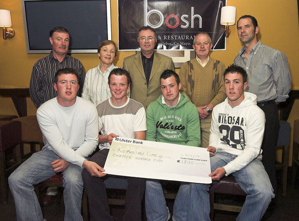 Pictured in Bosh at a presentation of a cheque for 1,800 euro the proceeds from the recently held table quiz to Paul, Brendan, Martin and Brian who will be climbing Kilimanjaro in September to raise funds for cancer research Front L-R: Paul Higgins, Brendan Coleman, Martin Moran, Brian King. Back L-R: Mick McDonnell (Bosh), Ann Coleman, Michael Larkin (Quizmaster), Jimmy Murphy (Scorekeeper), Des Carey (Bosh). Photo  Ken Wright Photography 2007.  