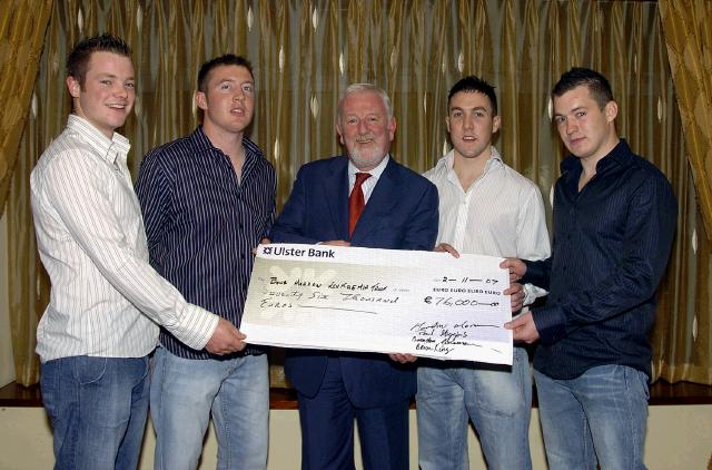 Presentation of a cheque for 76,000.00 Euro from the group of four young men who climbed Kilimanjaro in aid of the Bone Marrow Leukaemia Trust Cancer Research, receiving the cheque was Professor Sean McCann of St. James Hospital in Dublin L-R:  Brendan Coleman, Paul Higgins, Professor Sean McCann, Brian King, Martin Moran. Photo  Studio 094. 