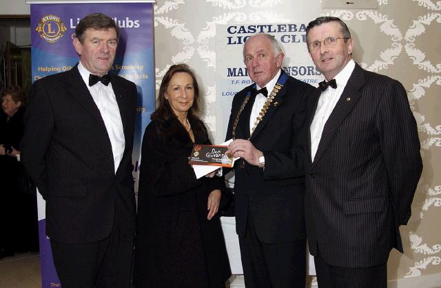 Pictured at the Castlebar Lions Club wine reception held in Days Hotel prior to the Opera Don Giovanni which was held in the TF Royal Hotel & Theatre. Presentation of the winning prize sponsored by Lough Lannagh Holiday Village. Carol McMann receiving the tickets to the opera and a voucher for weekend accommodation for six people in Lough Lannagh Holiday Village L-R: Tom Rice, Carol McMann, Eamonn Horkan President Castlebar Lions Club, Joe Staunton. Photo  Ken Wright Photography 2007.