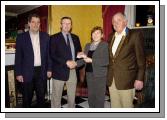 Members of Castlebar Lions Club pictured in the Imperial Hotel at a presentation of a cheque, the proceeds from the Christmas Food Appeal,  Maria Needham Treasurer Castlebar Chernobyl Childrens Outreach Group L-R: Gerry Needham, Joe Staunton Treasurer, Maria Needham, Eamonn Horkan President Castlebar Lions Club   .Photo  Ken Wright Photography 2007.
