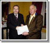Pictured in the Imperial Hotel Castlebar Eamonn Horkan President Castlebar Lions Club welcoming new member Enda McDonagh. Photo  Ken Wright Photography 2007.