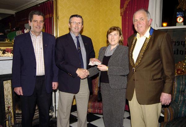 Members of Castlebar Lions Club pictured in the Imperial Hotel at a presentation of a cheque, the proceeds from the Christmas Food Appeal,  Maria Needham Treasurer Castlebar Chernobyl Childrens Outreach Group L-R: Gerry Needham, Joe Staunton Treasurer, Maria Needham, Eamonn Horkan President Castlebar Lions Club   .Photo  Ken Wright Photography 2007.