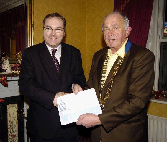 Pictured in the Imperial Hotel Castlebar Eamonn Horkan President Castlebar Lions Club welcoming new member Enda McDonagh. Photo  Ken Wright Photography 2007.