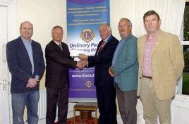Castlebar Lions Club presenting a cheque in support of the Mayo Peace Park Garden of Remembrance