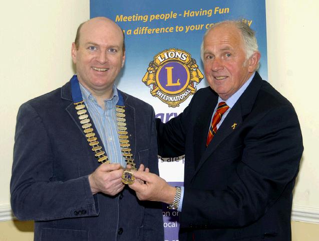 Pictured in the Imperial Hotel Eamon Horkan  Outgoing President Castlebar Lions Club handing over the chain of office to Michael Mullahy incoming President. Photo  Ken Wright Photography 2007. 


