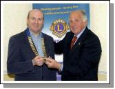 Pictured in the Imperial Hotel Eamon Horkan  Outgoing President Castlebar Lions Club handing over the chain of office to Michael Mullahy incoming President. Photo  Ken Wright Photography 2007. 


