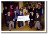 Pictured in Tolsters Bar Castlebar members of Mountdaisy Golf Team who raised 10,000 euros  for Mayo Cancer Support Association Front L-R: Angela Kirrane (Manager of Services MCSA), Tom Cusack, Finola OHealai (Treasurer MCSA), Kevin McGing, Karen McGing, Ann Duffy (MCSA). Back L-R: Kevin Timlin, Tom Cooke, Brendan Timlin, Gerry Tolster, Mary McDonagh (MCSA), Darren Mulligan, Tom Jennings, Joe Staunton (Vice Chairman MCSA). Gerry Tolster would like to thank Coleman Computers who donated a computer at cost price for the auction/race night. Photo  KWP Studio 094