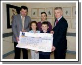 Pictured in Mayo general Hospital at a presentation of a cheque for 738 euro 85 cents from Katie, Cian and the Tighe Family Gallows Hill Castlebar the proceeds of their Christmas Lights Appeal in aid of the MRI Scanner. The family would like to thank everyone who contributed so generously. L-R: Mr Kevin Barry (Consultant Surgeon Mayo General Hospital), Mary Casey (Consultant Radiologist Mayo General Hospital), Tony Canavan (Manager Mayo General Hospital), Front Katie and Cian Tighe. Photo  Ken Wright Photography 2007. 

