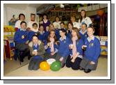 Pictured are members of the Irish Wheelchair Association who held a coffee morning in Castlebar Library in aid of the Telethon People In Need. Students from St. Josephs Secondary School were there to lend a helping hand Front L-R: Nicola Molloy, Sinead Guerin, Stacey Rice, Niamh Dunne, Maeve Tierney Middle L-R: Aisling Lydon, Kayleigh Garrett, Ciara Conway, Niamh ONeill, Ann Horan, Emer Carney, Samantha McDonagh. Back L-R: Caroline Madden, Frances Spindler, Martina Reid (organiser),Carmel Monaghan, Bridie OConnor, Fiona Gallagher. Photo  Studio 094. 