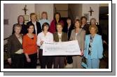 Pictured in Breaffy House Hotel Soroptomists International Castlebar presenting a cheque to Janet ONeill and Ann Whittle from the Mayo Rape Crisis Centre for 1,350 Euro, which is part of the proceeds of the Flag Day which was held in June.
Front L-R: Monica Nealon, Berni Rowland, Janet ONeill, Niamh OKeefe (President Castlebar Soroptomists), Ann Whittle, Maureen Tobin. Back L-R: Phil Armstrong (secretary), Nora Hoban, Teresa Waldron, Una Ainsworth, Noreen Walsh (Treasurer), Sheila Kilkelly, Maureen Gilmartin. Photo  Studio 094 

