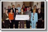 Pictured in Breaffy House Hotel Soroptomists International Castlebar presenting a cheque to Kathleen McHale (secretary) and PJ Murphy (Chairman) of the Mayo Mental Health Association for 1,350 Euro, which is part of the proceeds of the Flag Day which was held in June. Front L-R: Monica Nealon, Berni Rowland, Kathleen McHale, Niamh OKeefe (President Castlebar Soroptomists), PJ Murphy, Maureen Tobin, Maureen Gilmartin. Back L-R: Phil Armstrong (secretary), Nora Hoban, Teresa Waldron, Una Ainsworth, Noreen Walsh (Treasurer), Sheila Kilkelly. Photo  Studio 094 