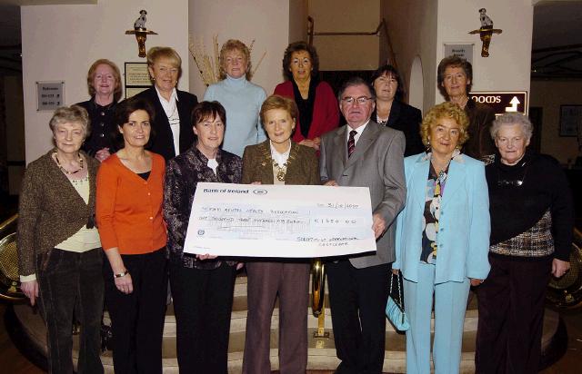 Pictured in Breaffy House Hotel Soroptomists International Castlebar presenting a cheque to Kathleen McHale (secretary) and PJ Murphy (Chairman) of the Mayo Mental Health Association for 1,350 Euro, which is part of the proceeds of the Flag Day which was held in June. Front L-R: Monica Nealon, Berni Rowland, Kathleen McHale, Niamh OKeefe (President Castlebar Soroptomists), PJ Murphy, Maureen Tobin, Maureen Gilmartin. Back L-R: Phil Armstrong (secretary), Nora Hoban, Teresa Waldron, Una Ainsworth, Noreen Walsh (Treasurer), Sheila Kilkelly. Photo  Studio 094 
