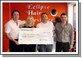 Presentation of a cheque for 1,500 euro from Eclipse Hair Designers Linenhall St Castlebar to John OShaughnessy Special Olympics Mayo Coordinator. L-R: Mick Monaghan, Marie Murray, John OShaughnessy, Pat Monaghan. The money was raised by Pat & Mick Monaghan proprietors of Eclipse who donated one days takings and also contributions from the public to the Special Olympics . They would like to thank Linda & Dick Heraty for their support also Mid West Radio for their contribution and to wish Deidre Garvin who will be representing Ireland in the Special Olympics Ten Pin Bowling which will take place in Japan .Photo  Ken Wright Photography 2007.  

