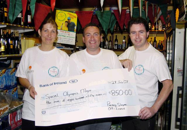 Presentation of a cheque from Sloyans Bar and Shop Linenhall St Castlebar to John OShaughnessy Special Olympics Mayo Coordinator. L-R: Louise McMahon, John OShaughnessy, Padraic Sloyan. 425 euro was raised by customers donations and Padraic Sloyan matched that by raising the total to 850 euro. Photo  Ken Wright Photography 2007.  