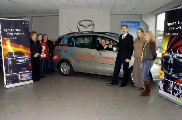 John OShaughnessy (Mayo Co-Ordinator Special Olympics), receiving the keys of a Mazda 5 courtesy car,  from David Monaghan (Monaghan & Sons Breaffy Rd Castlebar),  L-R: Pauline Flynn (Special Olympics), Jackie Murphy (Special Olympics), Ann Cattigan (Special Olympics),  John OShaughnessy, David Monaghan, Ryan Ring (Graphics Manager Connacht Signs) who designed the sign writing on the car for the Special Olympics, Maggie Ahern (Special Olympics) . Photo  Ken Wright Photography 2007