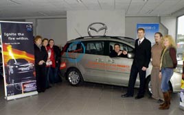 John O'Shaughnessy (Mayo Co-Ordinator Special Olympics), receiving the keys of a Mazda 5 courtesy car, from David Monaghan (Monaghan Motors). Click photo for details from Ken Wright.
