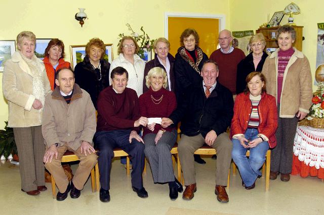 Pictured in the Sacred Heart Hospital Alo Filan, Pat McDonnell, Jim Docherty representing the Turlough Community 25 Card Game making a presentation of a cheque for 700 euro to Regina Mulrooney Chairperson Friends Sacred Heart. Front L-R: Alo Filan, Pat McDonnell, Regina Mulrooney, Jim Docherty, Ann OHara. Back L-R: Terese OHare, Carmel Condon, Maureen Tobin, Bridie McGinty, Mary Higgins, Nancy Rowland, Pat McGinty, Teresa Quigley, Pauline Jordan. The Turlough Community Committee hope to make this an annual event  and  wish to thank everyone who donated spot prizes and supported the evening. Photo  Ken Wright Photography 2007. 