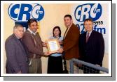 Pictured in the Castlebar Community Radio studio at a presentation of an Craol National Achievements Award 2007 Presented by Diarmuid McIntyre (Craol Development Advisor),  for the Survival English Programme. L-R: Jackie Loftus (board Member), Martin Waters (Chairman CRC), Fiona Quinn Bailey ((Writer and Presenter of Survival English Programme), Diarmuid McIntyre, Pat Stanton (Secretary CRC FM). Photo  Ken Wright Photography 2008