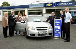 Monica Szymamska Castlebar receiving the keys of a Chevrolet Aveo 1.4 4 door saloon in the July Credit Union Car Competition
