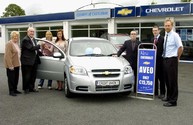 Castlebar Credit Union Members Draw Car winner pictured at Clearys Car Sales Breaffy Rd Castlebar.  Monica Szymamska Castlebar receiving the keys of a Chevrolet Aveo 1.4 4 door saloon from Paddy Glynn L-R; Margaret Walsh (Credit Union), Paddy Glynn (Credit Union), Roxanne Suszek, Monica Szymamska, Paul Ginty (Sales Manager), Declan Clarke (After sales Manager). Paul Cleary (Dealer Principal).  Photo  KWP Studio 094. 

