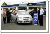 Castlebar Credit Union Members Draw Car winner pictured at Clearys Car Sales Breaffy Rd Castlebar.  Monica Szymamska Castlebar receiving the keys of a Chevrolet Aveo 1.4 4 door saloon from Paddy Glynn L-R; Margaret Walsh (Credit Union), Paddy Glynn (Credit Union), Roxanne Suszek, Monica Szymamska, Paul Ginty (Sales Manager), Declan Clarke (After sales Manager). Paul Cleary (Dealer Principal).  Photo  KWP Studio 094. 

