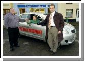 Castlebar Credit Union autumn members draw car winner Teresa Rooney from Balla Being handed the keys of a Toyota  Yaris 1lt car outside the Credit Union Office in Balla by  Tom Cusack  ( Castlebar / Balla Credit Union), Teresa  Rooney, Brian Joyce (General Manager/Sales Pat Kelly Autopoint Ballinrobe Rd Castlebar . Photo  Ken Wright Photography 2007.