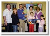 Pictured on International Credit Union Day are winners of the Castlebar Credit Union Juniors Members Draw with their families L-R: John Walsh (CU), Denise Kinsella (CU), Walter Brennan, Ciara Brennan, Geraldine Brennan, Patricia Walsh (CU), Laura Brennan (winner under 12s section) and Aoife Brennan. Photo  Studio 094. 

