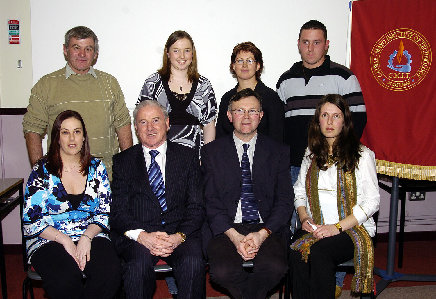 GMIT Castlebar presentation of certificates held in the Davitt room. 
Students who received Certificates in Beginners & Digital Photography Front l-R: Michelle Bayliss, Bernard OHara (Head GMIT Castlebar), Brian Mulhern (Head of Department), Aiga Browick, Back L-R: Michael McDonagh, Laura Grenen, Helen Munnelly, Colin Lynott. Photo  Ken Wright Photography 2007. 
