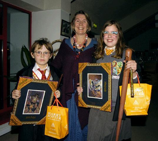 Pictured at Castlebar Library, at the launch of J K Rowlings Harry Potter and the Deathly Hallows. Sarah Rutledge and David Rutledge with Maria Farrell Director of the Linenhall Arts Centre Photo  Ken Wright Photography 2007.  