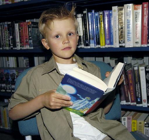 Pictured at Castlebar Library, at the launch of J K Rowlings Harry Potter and the Deathly Hallows. Vlav Khokhe enjoying the hair-raising story .  Photo  Ken Wright Photography 2007. 