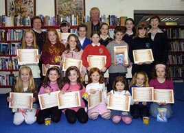 Youngsters who recently received their certificates and prizes for their participation in the Kiltimagh Library Children's Book Club. Click photo for details from Ken Wright.