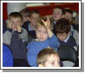 Mayo Libraries Childrens Book Festival author Malachy Doyle reading from some of his books to children from St. Anthonys, Scoil Raifteri and St. Angelas National Schools in Castlebar Library. Hands Up!. Photo  studio 094. 