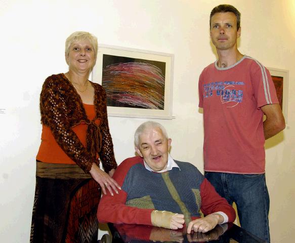 Pictured in the Linenhall Arts Centre Castlebar the Autumn into Summer Art Exhibition by a group of artists from the Sacred Heart Hospital Castlebar which was opened by Deirdre Walsh (Arts Programme Co-ordinator HSE West). Tony Feehan (Artist) pictured with Regina Mulrooney (Friends of the Sacred Heart Home) and Mark Walsh artist in residence. Photo  Ken Wright Photography 2007