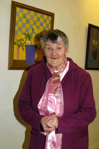 Pictured in the Linenhall Arts Centre Castlebar the Autumn into Summer Art Exhibition by a group of artists from the Sacred Heart Home Castlebar which was opened by Deirdre Walsh (Arts Programme Co-ordinator HSE West). Myrna Hayden with one of her paintings which was on display. Photo  Ken Wright Photography 2007 


