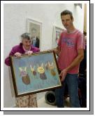 Pictured in the Linenhall Arts Centre Castlebar the Autumn into Summer Art Exhibition by a group of artists from the Sacred Heart Home Castlebar which was opened by Deirdre Walsh (Arts Programme Co-ordinator HSE West). Myrna Hayden with one of her paintings which was on display and Mark Walsh artist in residence. Photo  Ken Wright Photography 2007 

