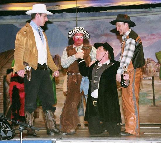 Sheriff gets arrested L-R Colin Foley as Clint Westwood, John Gavin as The Sun Tanned Kid, Des Gilsenan as Sheriff Small Holding & Stephen Guthrie as Butch Casserole.Photo  Ken Wright Photography 2005
