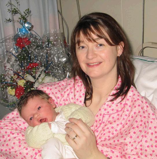Congratulations to Noreen Quinn and Sean Donoghue
The first Baby born in Mayo General  Hospital in 2005  Baby Conor Donoghue  born at 12. 24 am and weighed 8 pounds 12 ounces. Photo Copyright Ken Wright Studio 094. 
 