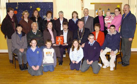 Vodafone and Castlebar Chamber of Commerce Announce Award Winner
Fintan Staunton Honoured with Vodafone Passion for the World Around Us Award
Front L-R: Ciara Mullins, Paul Murray, Suzanne Murray, Mark Murray, Middle L-R: Julie Quinn, Hank Wyers, Michelle Halloran representing Vodafone, Fintan Staunton Vodafone recipient, Pat Murray President Castlebar Chamber of Commerce, Eileen Staunton, Ronan Staunton. Back L-R: Ann Halpin, Nuala Mullins, Dolores McCormack, Alicia Murray, Mary Gilhooley, Phil OBrien, Michael OBrien, Hanneke Wyers, Alanna Halpin, Carol Halpin, Ernie Sweeney: Photo  Ken Wright Photography 2005.
