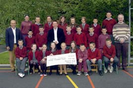 Sixth Class, Breaffy National School presented the proceeds of their jumble sale, cake sale and fund day events to three charities. Click photo for more from Ken Wright.