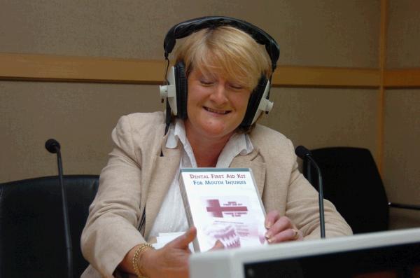 Margaret O'Malley(Dentist) who has produced a dental first aid kit for mouth injuries pictured with Tommy Marron (Mid West Radio)  Photo Ken Wright Photography Studio 094. 