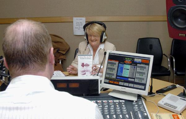 Margaret O'Malley(Dentist) who has produced a dental first aid kit for mouth injuries pictured with Tommy Marron (Mid West Radio)  Photo Ken Wright Photography Studio 094. 