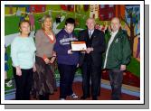 Patrick Tare, who won a merit award in the  Credit Union National Poster, Competition from  St Brids Special School Castlebar L-R: Christine Walsh Deputy Principal, Majella Murray Teacher, Patrick Tare, Paddy Glynn Credit Union, John OBrien Credit Union . Photo  Ken Wright Photography 2007. 