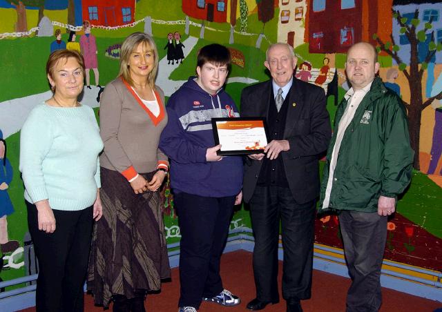 Patrick Tare, who won a merit award in the  Credit Union National Poster, Competition from  St Brids Special School Castlebar L-R: Christine Walsh Deputy Principal, Majella Murray Teacher, Patrick Tare, Paddy Glynn Credit Union, John OBrien Credit Union . Photo  Ken Wright Photography 2007. 