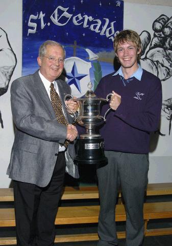 St. Geralds College Achievements Evening
Frank Durcan of Property Partners Durcan Auctioneers Castlebar (Sponsor) presenting the De La Salle Association Cup  for the Junior Sportsman of  the Year to Peter Lyons   Photo  Ken Wright Photography 2007 
