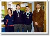 Pictured in St. Geralds College Castlebar are the students who won medals in the All Ireland Track and Fields Events. L-R: Karen  McNulty (P.E. Teacher), Gerard Kelly (1st All Ireland Inter Hammer), Mark Regan (2nd junior hurdle & 3rd junior high jump) with Sean Bourke (Acting Principal). Photo  Ken Wright Photography 2007. 

