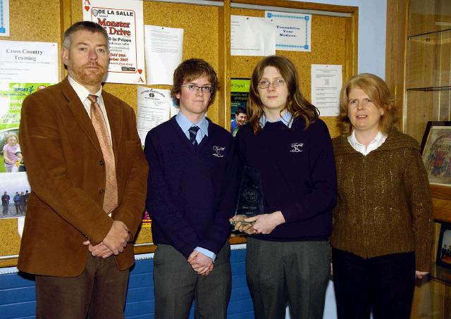 Pictured in St. Geralds College Castlebar is the West of Ireland Debating Competition senior section winners debating team Rian Derrig and Aidan Rowe with Sean Bourke (Acting Principal) and Veronica Rowe (Debating Co-ordinator). Photo  Ken Wright Photography 2007. 

