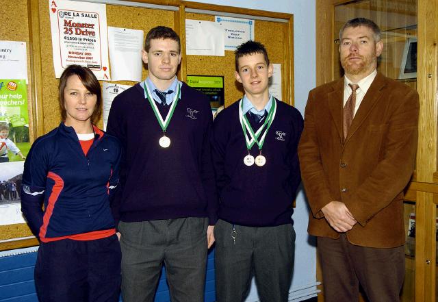 Pictured in St. Geralds College Castlebar are the students who won medals in the All Ireland Track and Fields Events. L-R: Karen  McNulty (P.E. Teacher), Gerard Kelly (1st All Ireland Inter Hammer), Mark Regan (2nd junior hurdle & 3rd junior high jump) with Sean Bourke (Acting Principal). Photo  Ken Wright Photography 2007. 

