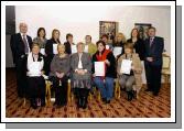 Pictured in Days Hotel Castlebar at a presentation of FETAC certificates in Special Needs Front L-R: Jacqui Murphy, Aine Quigley, Teresa McGuire (Chairperson Adult Education Board VEC), Lorraine Cawley, Bina Jennings. Back L-R: Martin Brett (FAS Services Business West Region, Helen Igoe, Christine McLoughlin, Breege Ormsby, Ann Cattigan, Liz McHale, Maggie Ahern, Teri Gallagher,  Pat Stanton (CEO Mayo Adult Education Centre). Photo  Ken Wright Photography 2007.

