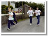 Balla 13th Annual 10K Road Race 2007,  Catch me if you can  Photo  Ken Wright Photography 2007. 
