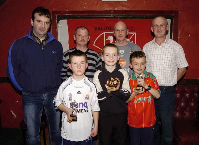Ballyglass Football Club Youths Awards presentations held in the Squealing Pig Ballyglass Front L-R: Gerry Canavan (Under 10s Player of the Year), David Sloyan (Under 10s most improved player), Cian McDonald (Under 9s Player of the Year), Back L-R: Cyril Burke (Coach), Tommy Hughes (Coach), Paul Byrne (Mayo Development Officer AFI), Sean Gilligan (Team Manager). Missing from photo Oisin McGovern (Under 9s most improved player),: Photo  Ken Wright Photography 2007